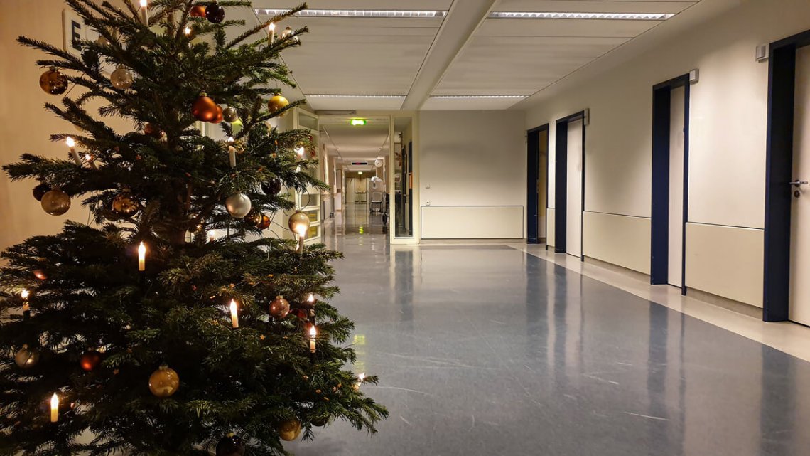 Decorated Christmas tree in the hallway of the hospital